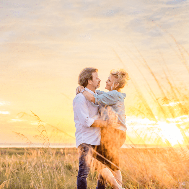 siesta key photographer captures couple celebrating anniversary with a beach photography session in siesta key at sunset